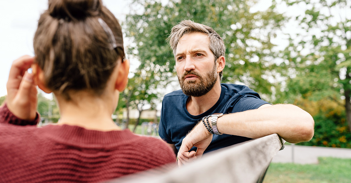 Father talking to daughter